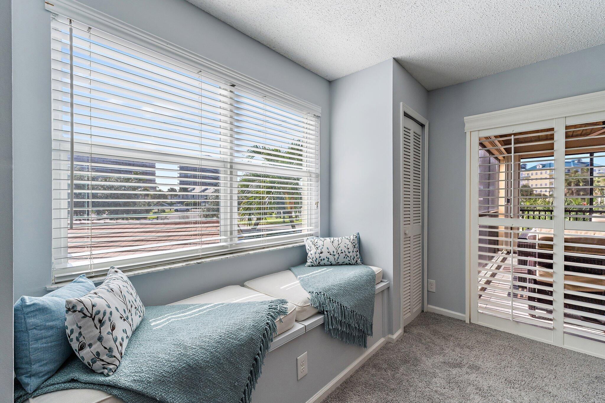 4161 U.S. Highway 1, Unit G3 Jupiter, FL 33477 - Photo 30 of 71 a bedroom with furniture and a window