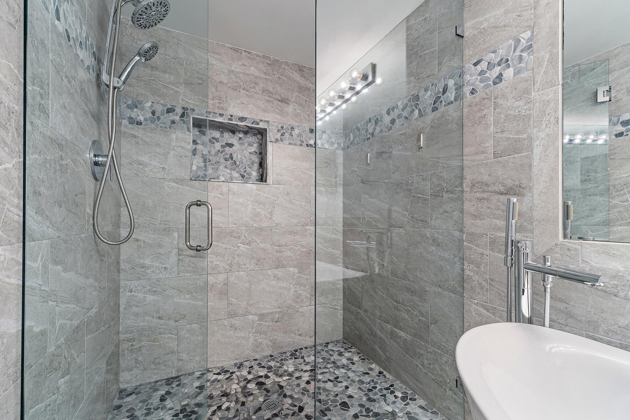 4161 U.S. Highway 1, Unit G3 Jupiter, FL 33477 - Photo 35 of 71 a bathroom with a shower