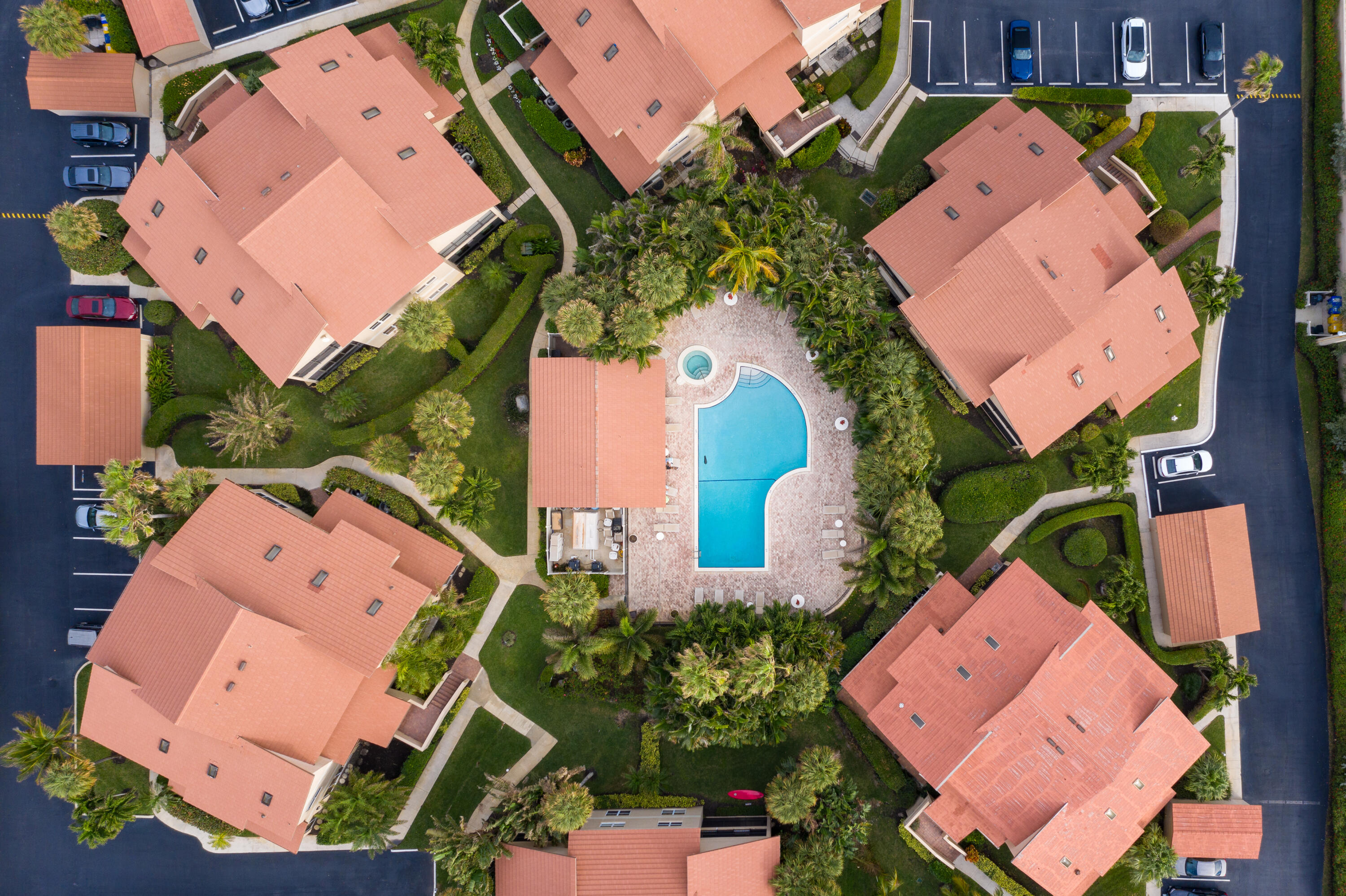4161 U.S. Highway 1, Unit G3 Jupiter, FL 33477 - Photo 53 of 71 an aerial view of a house with a yard and pool