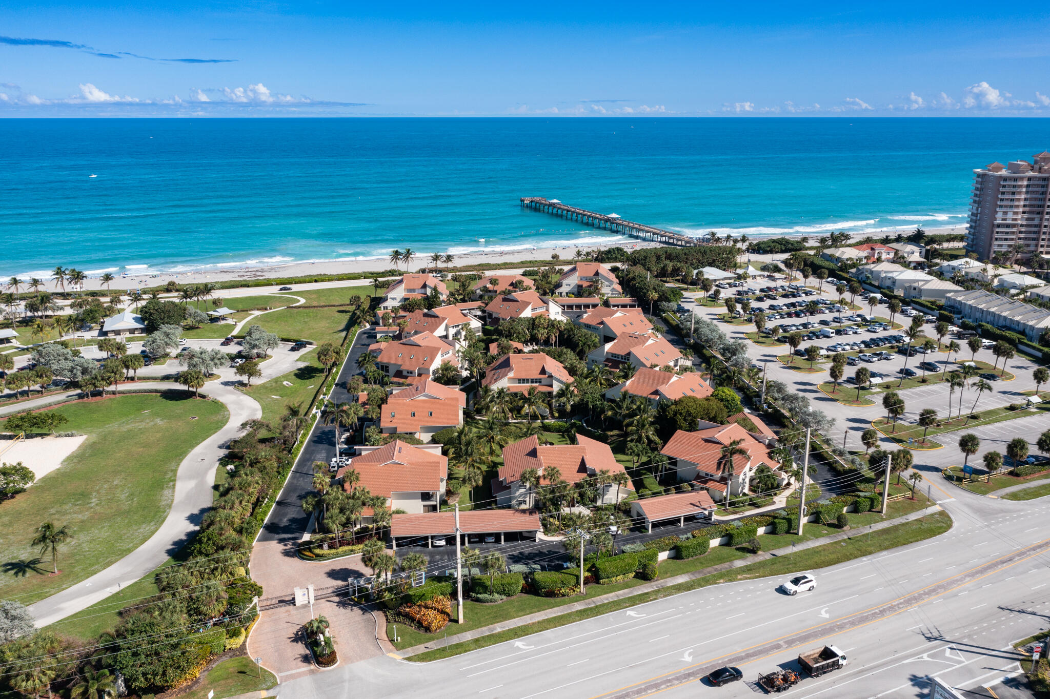 4161 U.S. Highway 1, Unit G3 Jupiter, FL 33477 - Photo 56 of 71 an aerial view of ocean and residential houses