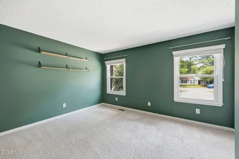 a view of a room that has a washer and dryer