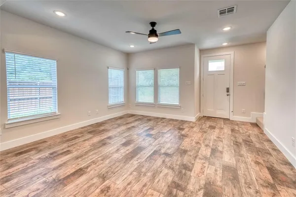 a view of an empty room and window