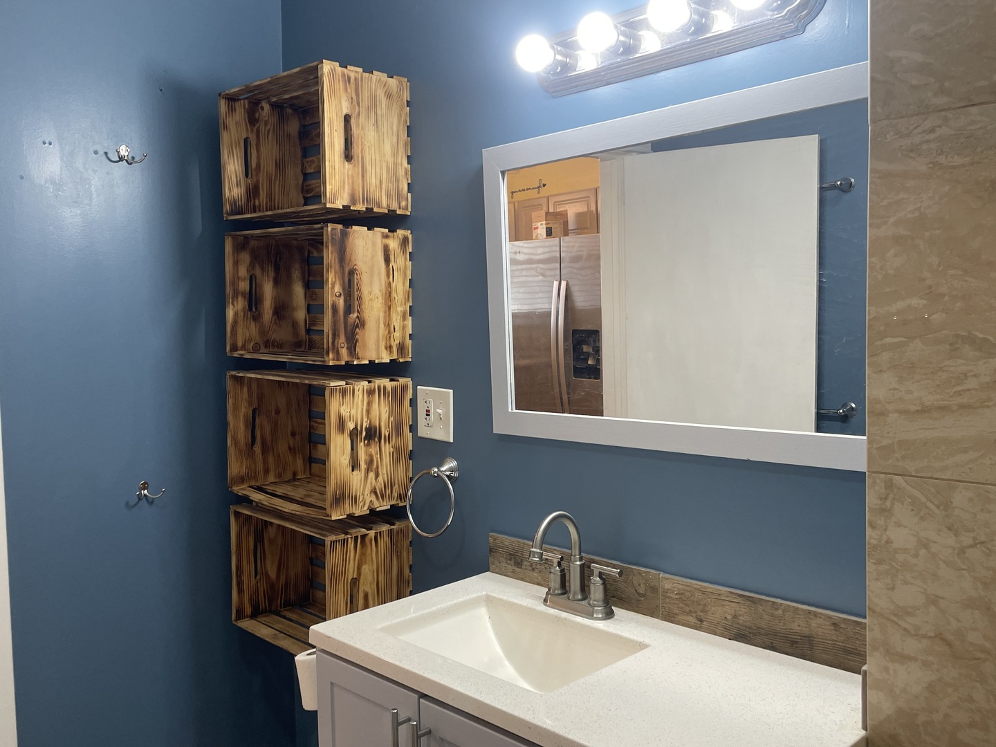 214 North 3rd Street Clinton, IA 52732 - Photo 10 of 11 a bathroom with a sink and a mirror