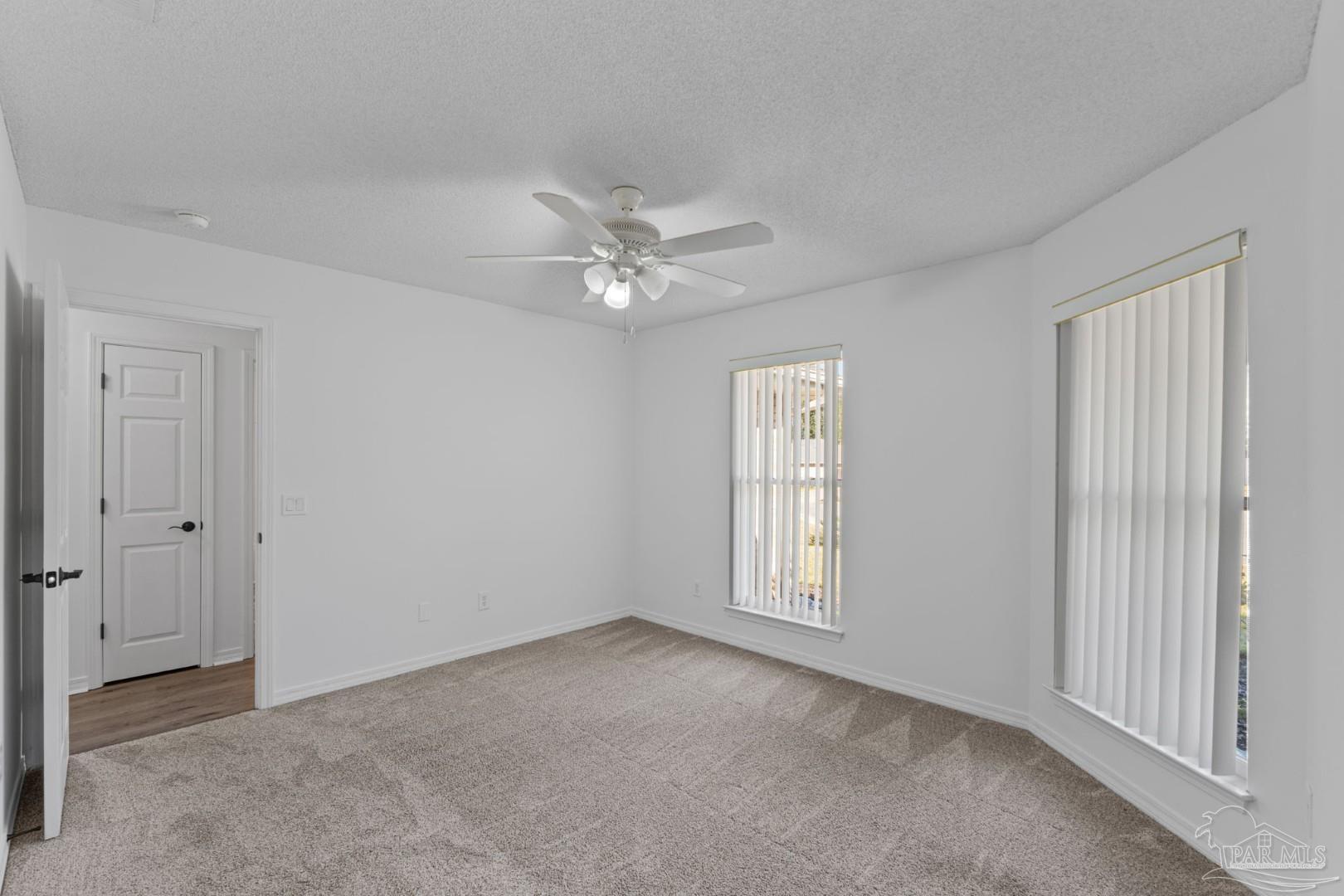 11841 Old Course Road Cantonment, FL 32533 - Photo 24 of 46 a view of an empty room with a window