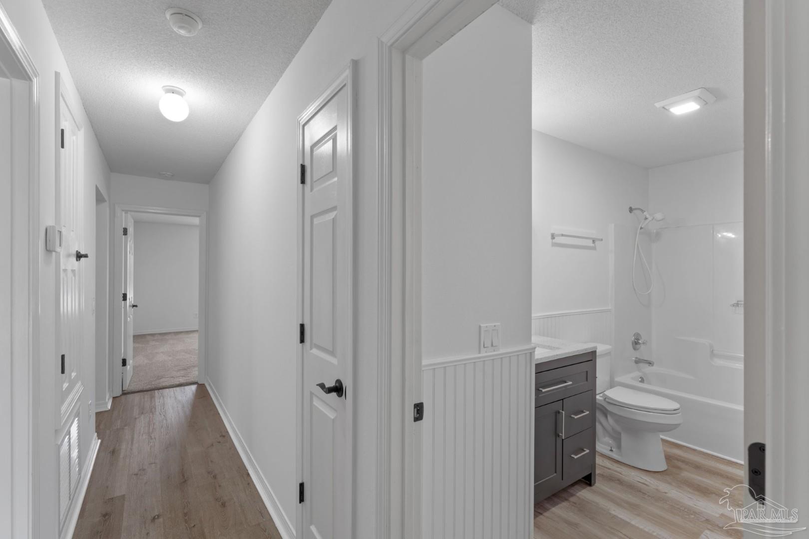 11841 Old Course Road Cantonment, FL 32533 - Photo 27 of 46 a bathroom with a sink and a toilet