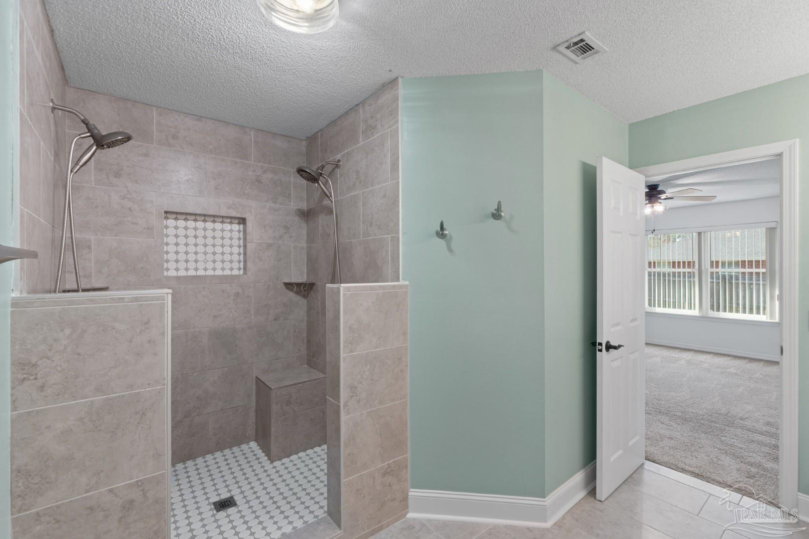11841 Old Course Road Cantonment, FL 32533 - Photo 35 of 46 a bathroom with a shower
