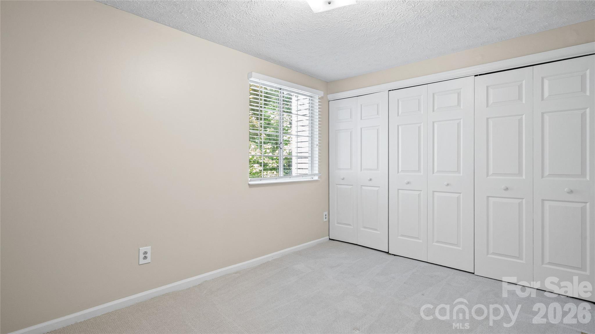 1231 Scaleybark Road Charlotte, NC 28209 - Photo 13 of 31 an empty room with windows