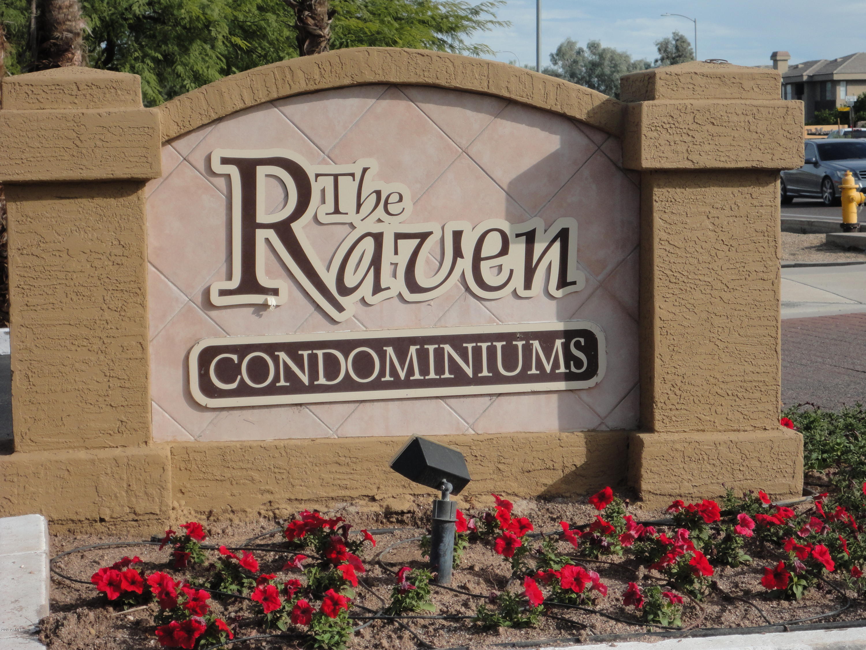 3434 East Baseline Road, Unit 166 Phoenix, AZ 85042 - Photo 1 of 13 a street sign that is on a wooden wall