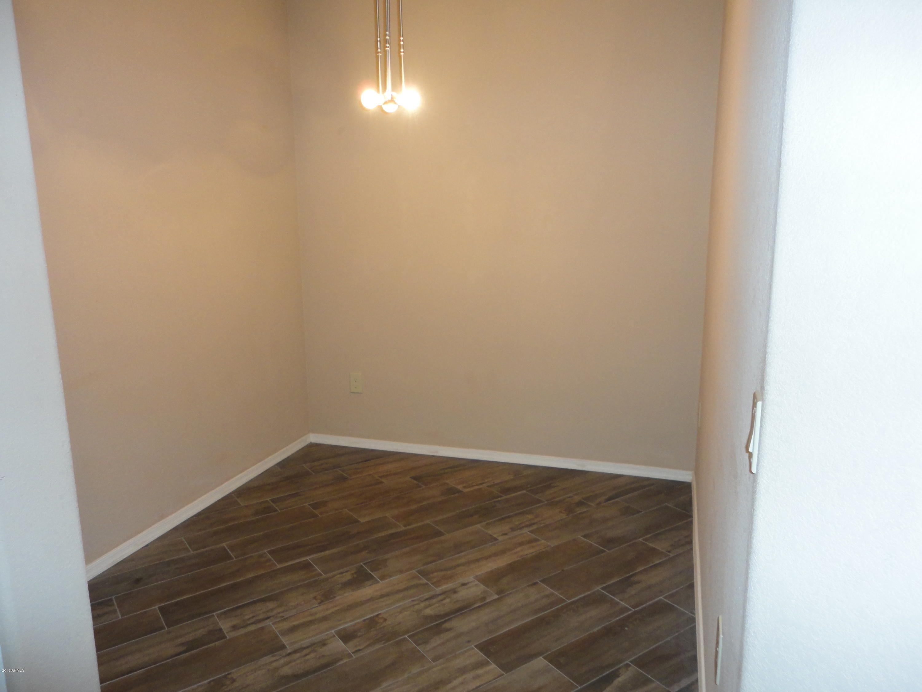 3434 East Baseline Road, Unit 166 Phoenix, AZ 85042 - Photo 6 of 13 a view of an empty room