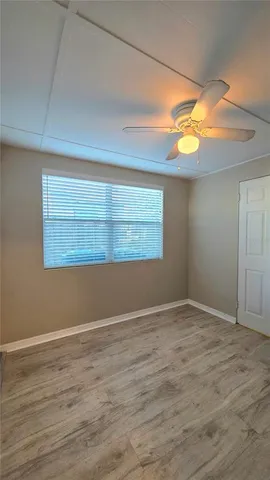 a room with furniture and screen