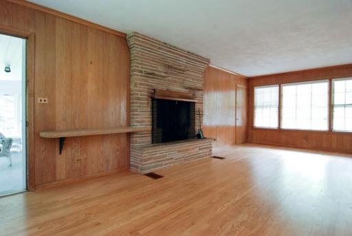 340 Moraine Road Highland Park, IL 60035 - Photo 4 of 10 a view of an empty room with a window and wooden floor
