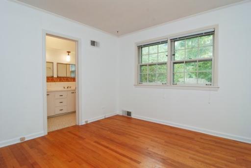 340 Moraine Road Highland Park, IL 60035 - Photo 6 of 10 a big room with wooden floor and windows
