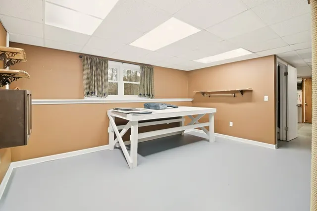 a room with furniture and window