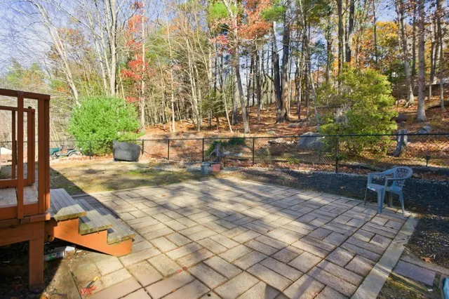 a view of a yard covered with snow