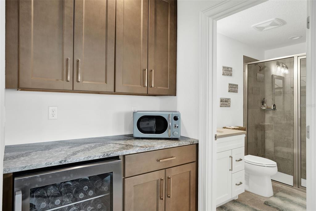 7 Marden Drive Ormond Beach, FL 32176 - Photo 13 of 68 a bathroom with a granite countertop toilet and a sink
