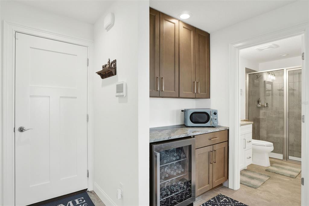 7 Marden Drive Ormond Beach, FL 32176 - Photo 14 of 68 a bathroom with a granite countertop sink a toilet and shower