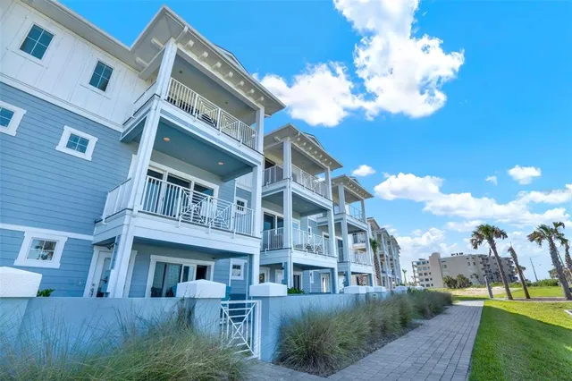 a view of a building with a yard
