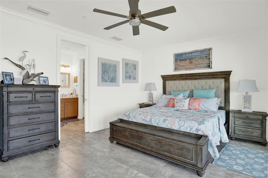 7 Marden Drive Ormond Beach, FL 32176 - Photo 38 of 68 a bedroom with a bed and a dresser