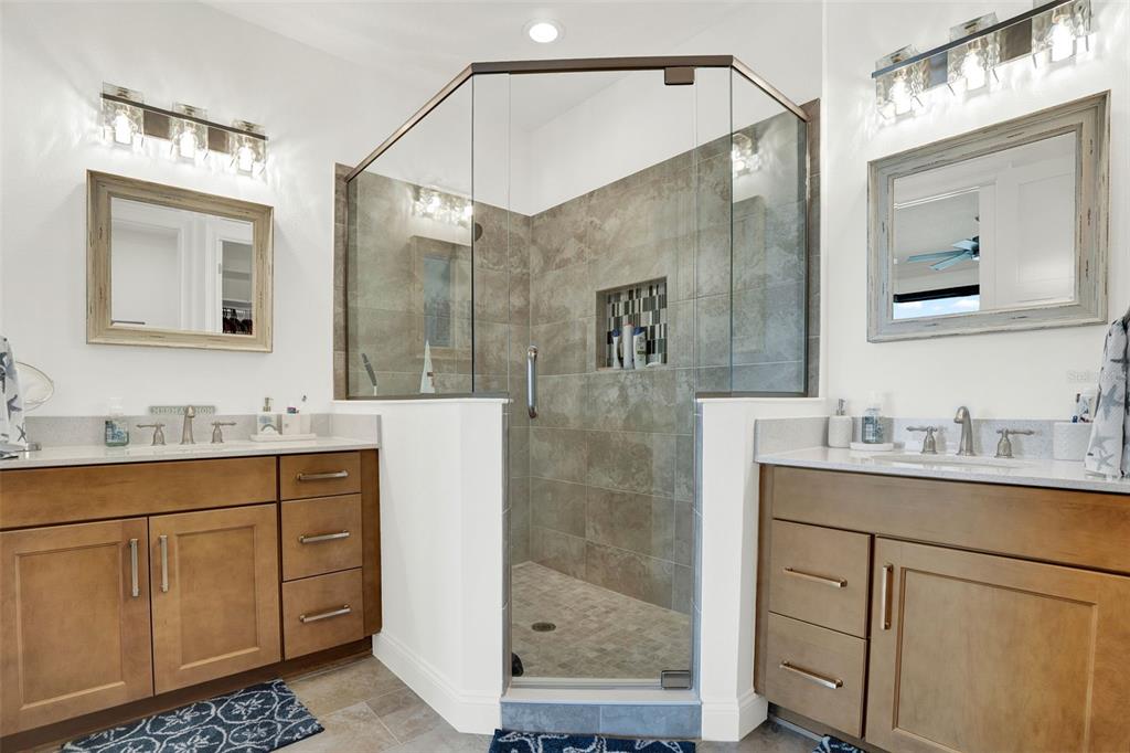 7 Marden Drive Ormond Beach, FL 32176 - Photo 40 of 68 a bathroom with a granite countertop sink mirror and double