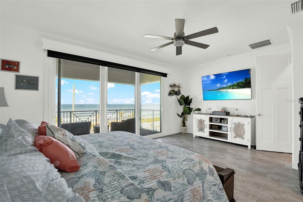 7 Marden Drive Ormond Beach, FL 32176 - Photo 41 of 68 a bedroom with a bed and a flat screen tv