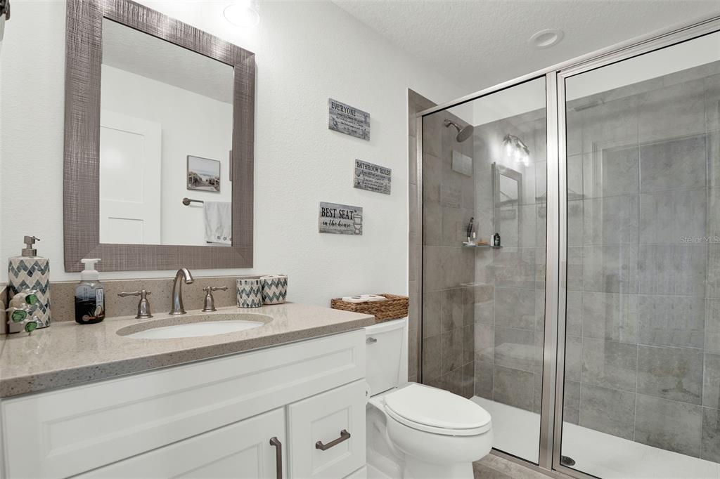 7 Marden Drive Ormond Beach, FL 32176 - Photo 43 of 68 a bathroom with a sink a toilet and shower