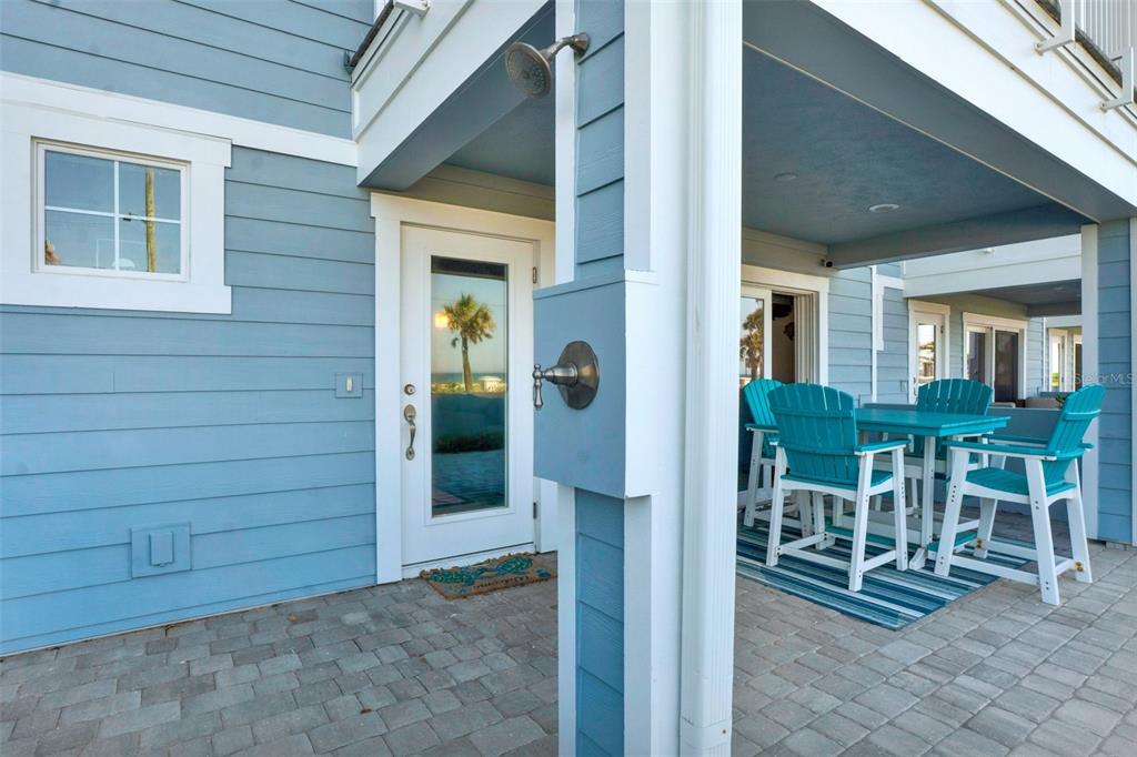 7 Marden Drive Ormond Beach, FL 32176 - Photo 8 of 68 a view of a porch with chairs and tables