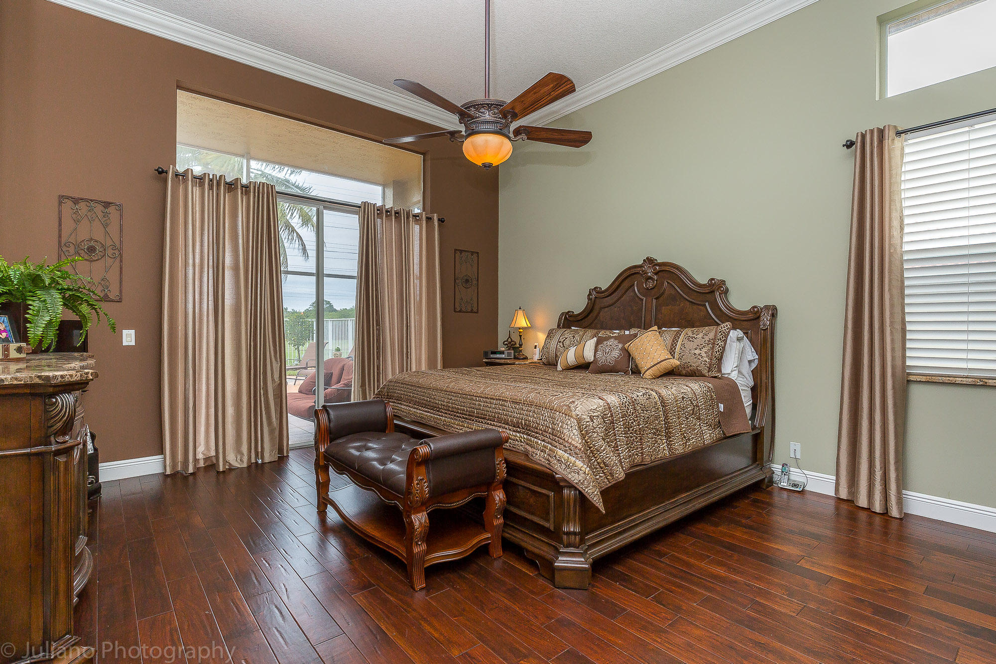 10880 Tea Olive Lane Boca Raton, FL 33498 - Photo 11 of 56 a bedroom with a bed and a window
