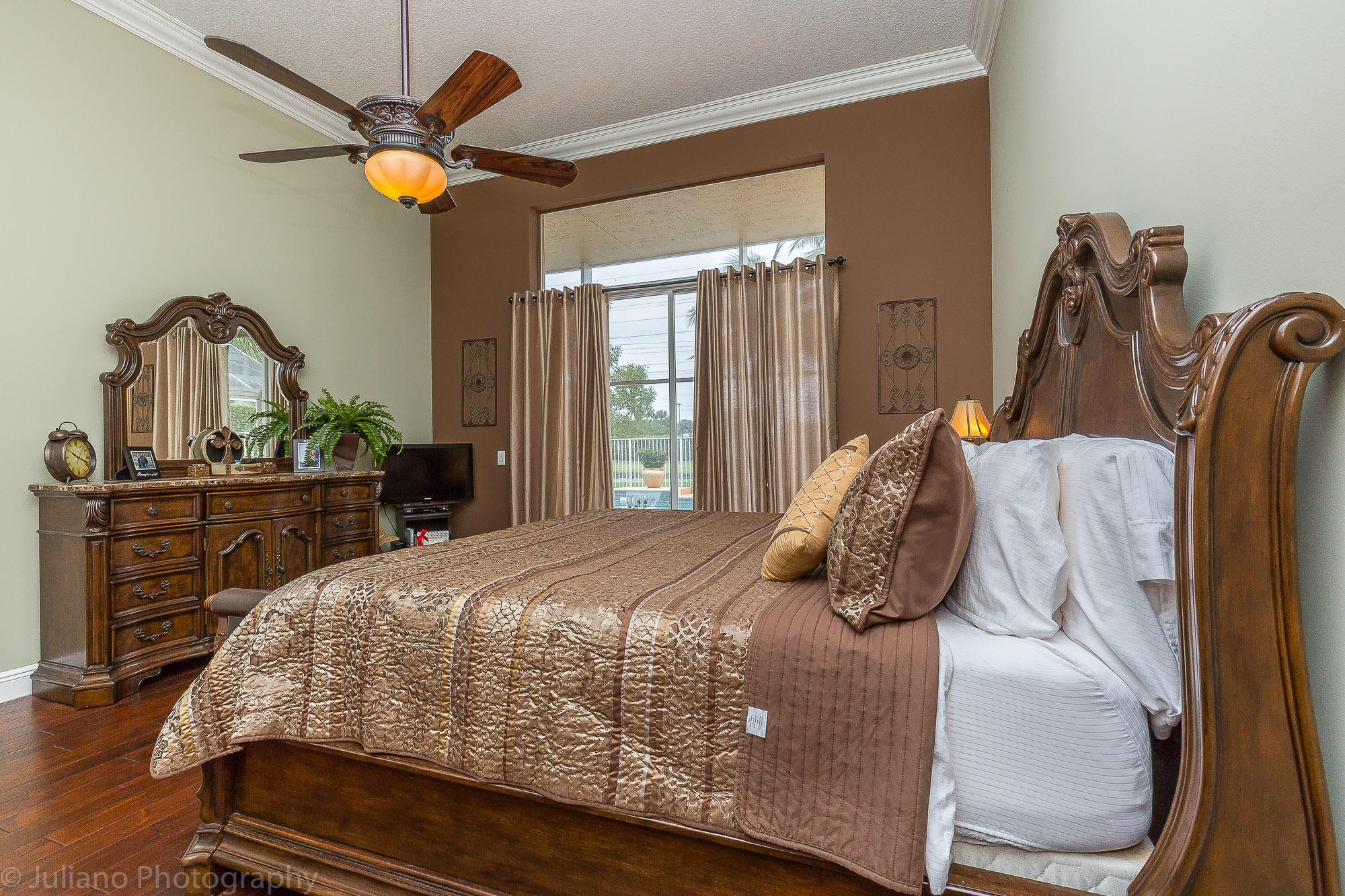10880 Tea Olive Lane Boca Raton, FL 33498 - Photo 12 of 56 a bedroom with a bed and dresser