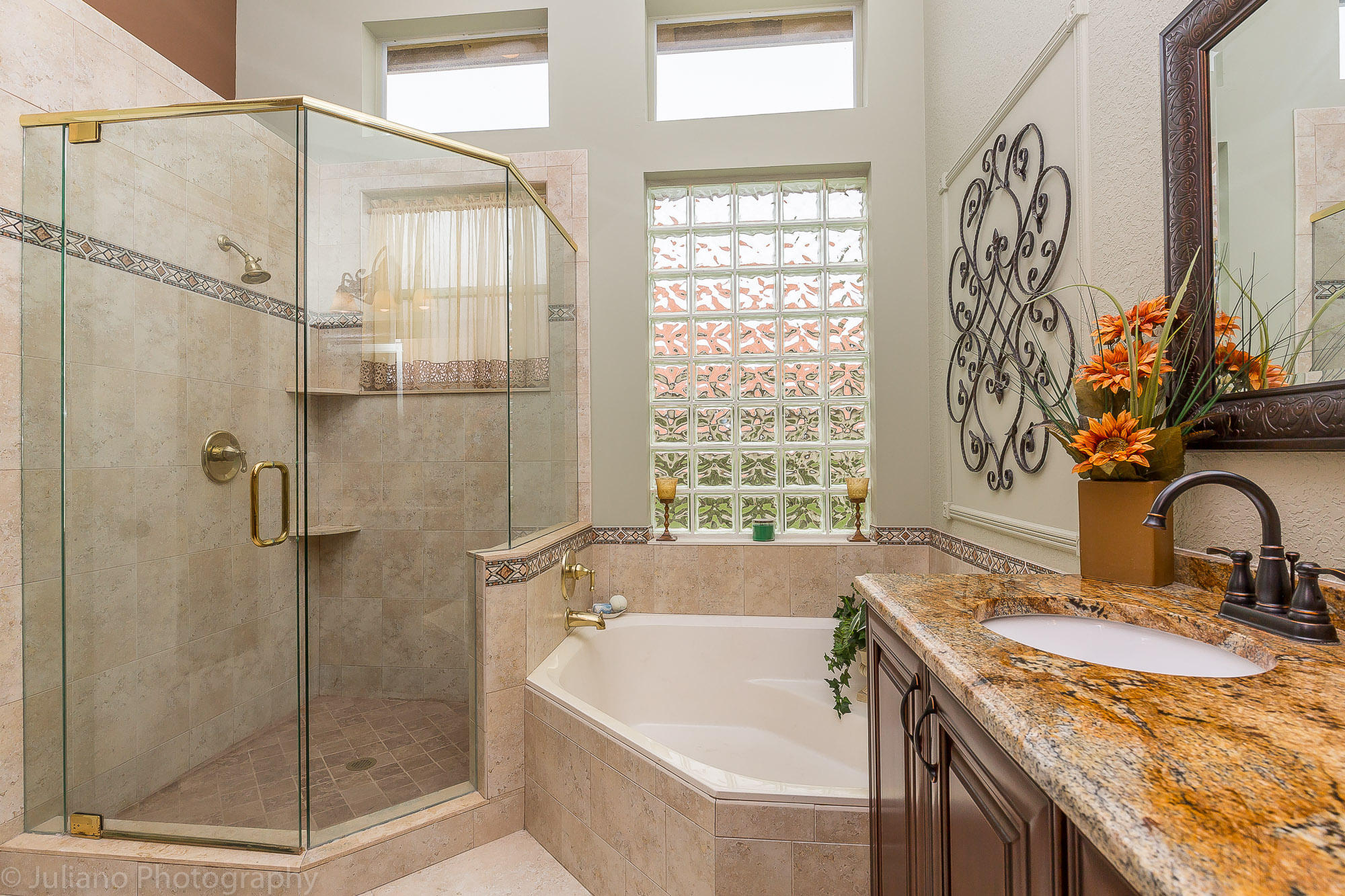 10880 Tea Olive Lane Boca Raton, FL 33498 - Photo 15 of 56 a bathroom with a granite countertop sink a mirror and a shower