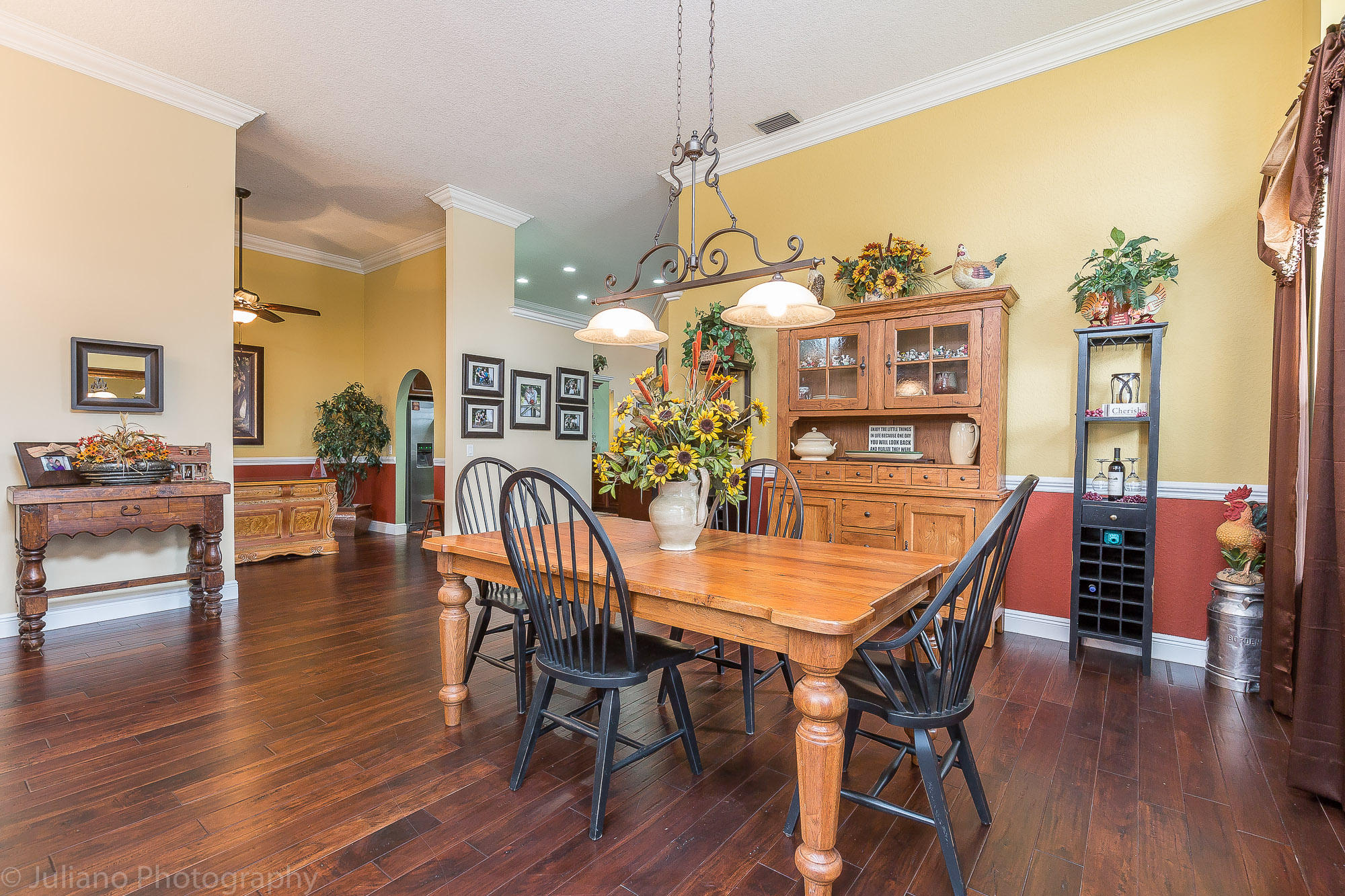 10880 Tea Olive Lane Boca Raton, FL 33498 - Photo 17 of 56 a dining room with furniture and wooden floor
