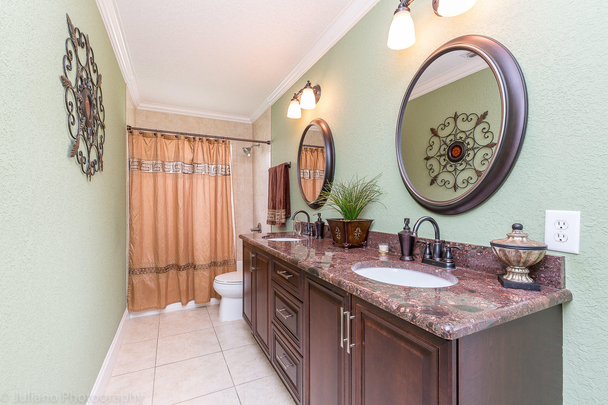 10880 Tea Olive Lane Boca Raton, FL 33498 - Photo 24 of 56 a bathroom with a granite countertop double vanity and a mirror