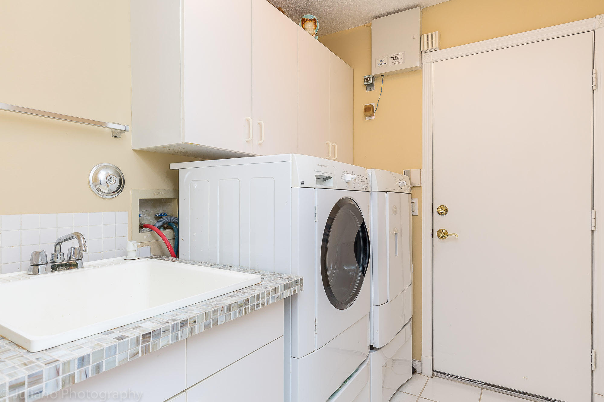 10880 Tea Olive Lane Boca Raton, FL 33498 - Photo 26 of 56 a utility room with dryer and washer