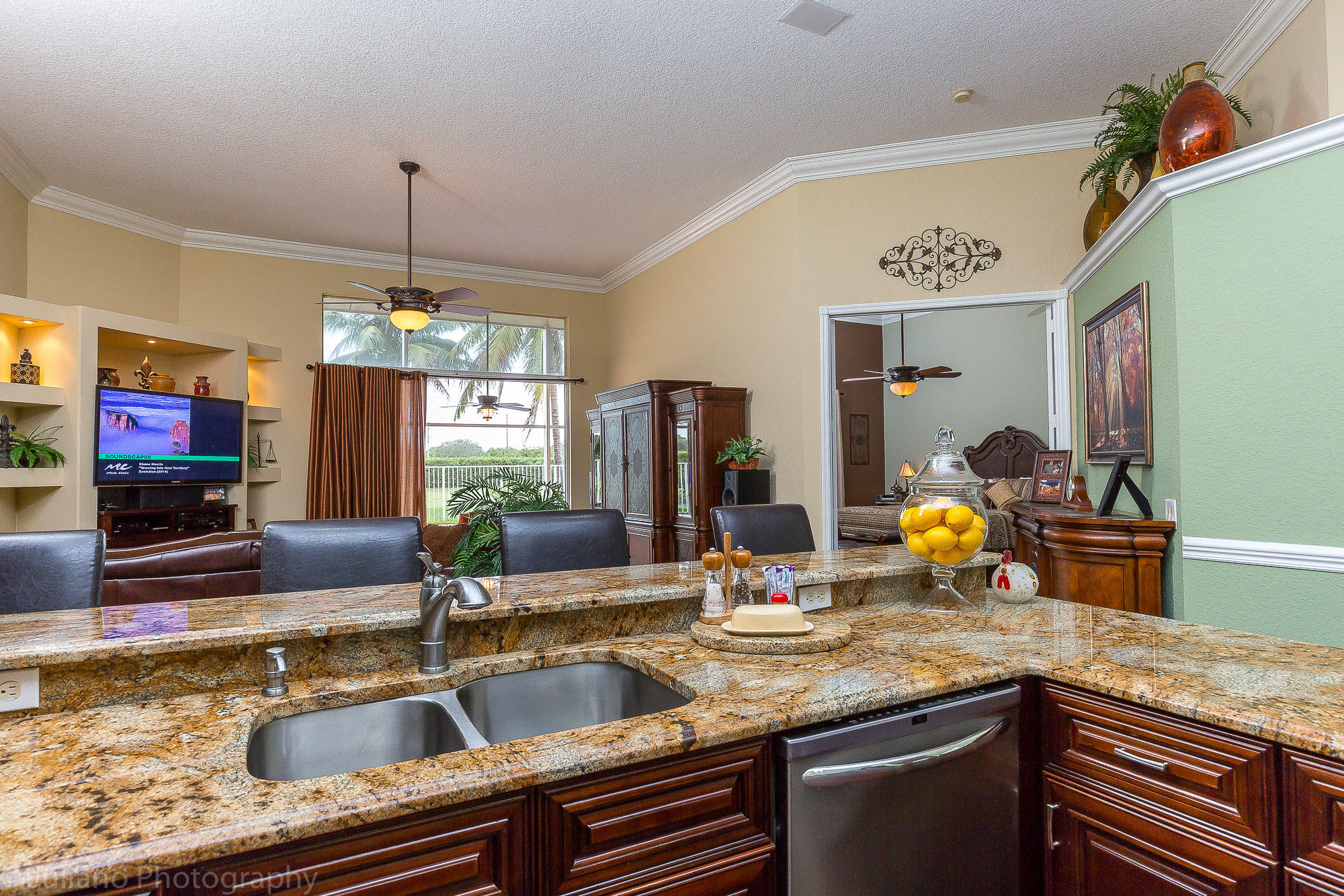 10880 Tea Olive Lane Boca Raton, FL 33498 - Photo 4 of 56 a kitchen with a sink and a granite counter top