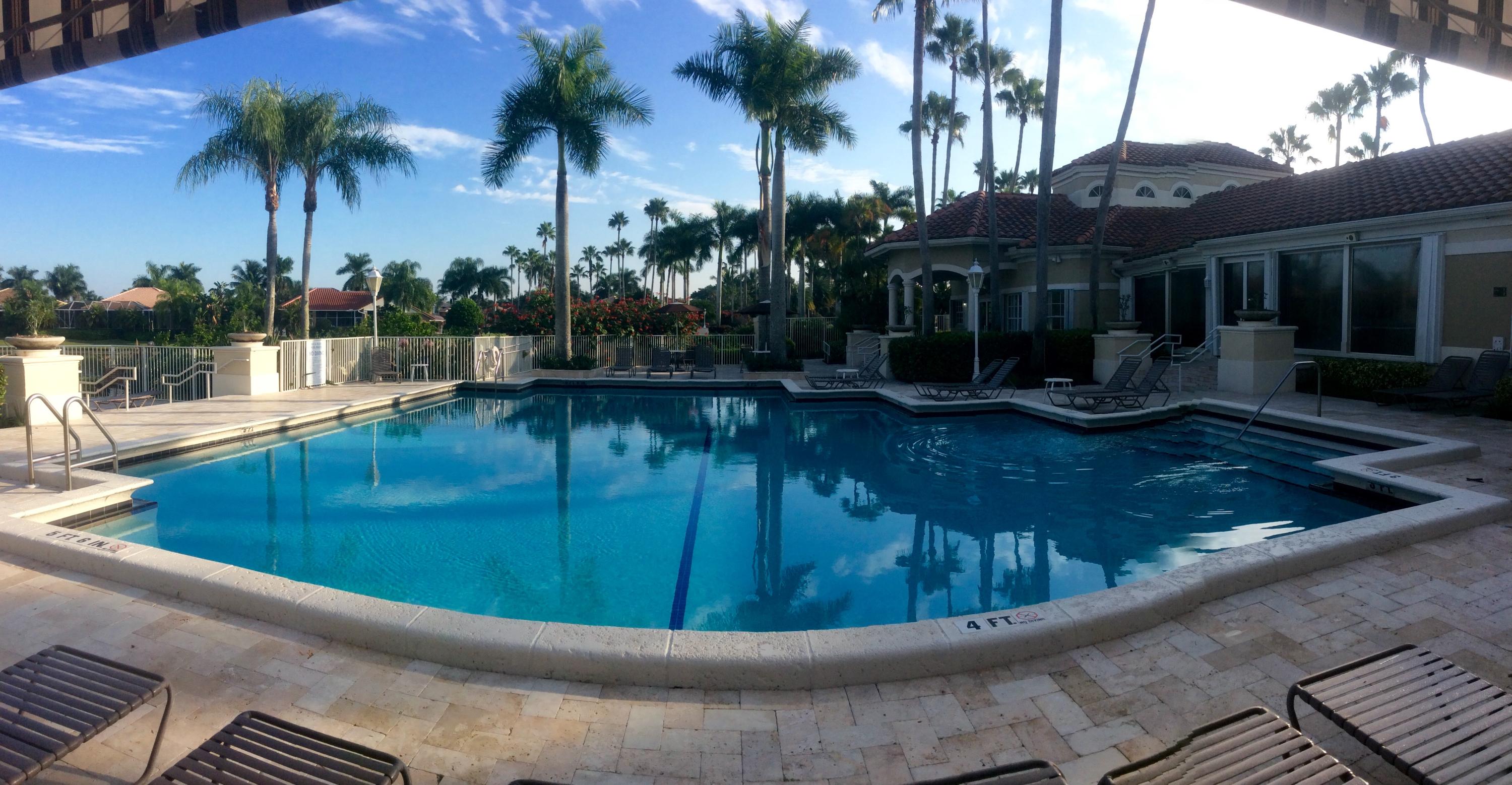 10880 Tea Olive Lane Boca Raton, FL 33498 - Photo 47 of 56 a view of a swimming pool with a patio