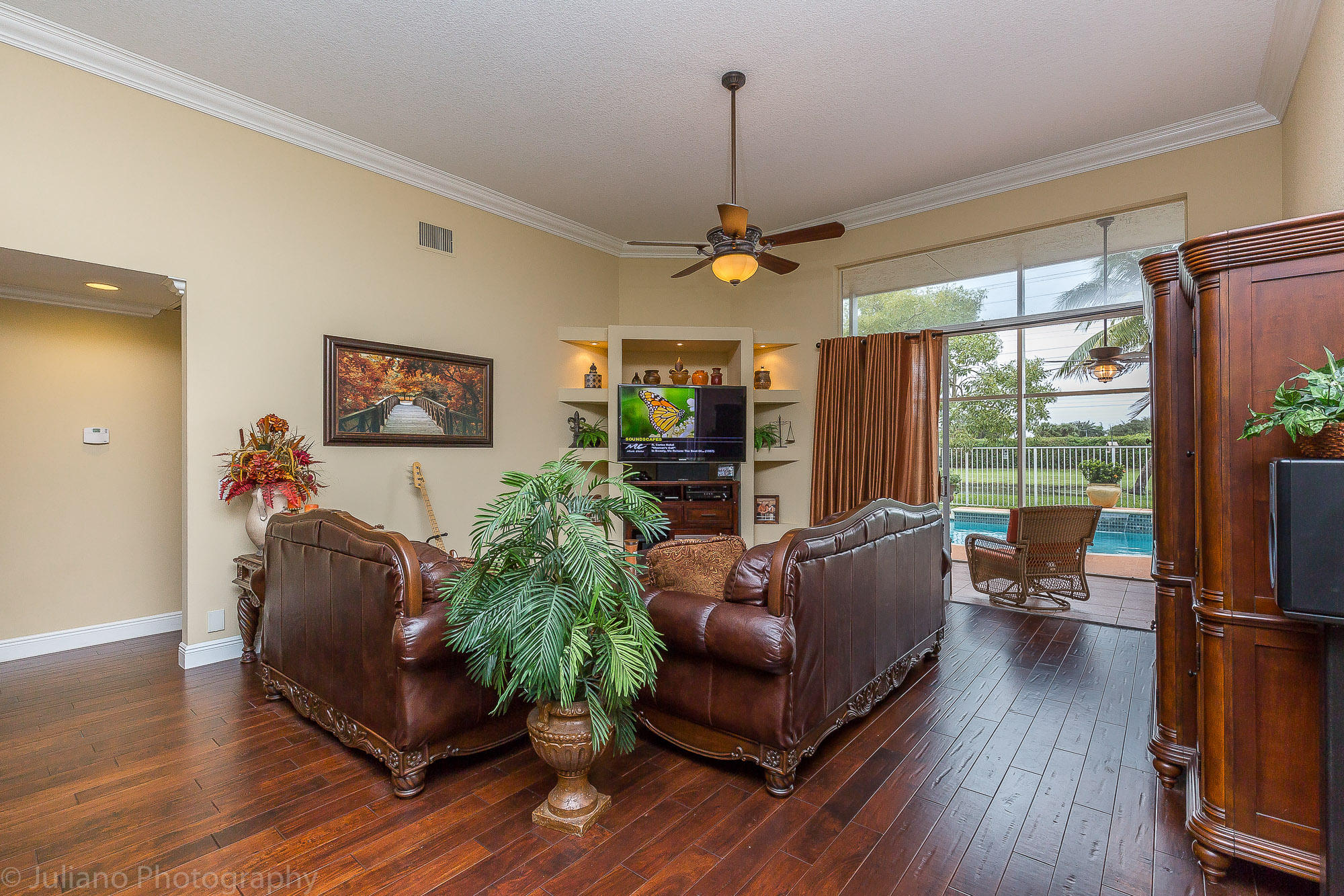 10880 Tea Olive Lane Boca Raton, FL 33498 - Photo 9 of 56 a living room with furniture and a flat screen tv