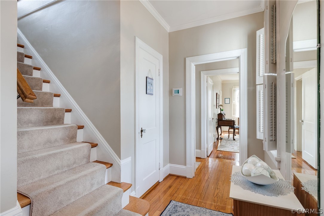 501 Old Hundred Road Midlothian, VA 23113 - Photo 13 of 44 a view of a hallway with wooden floor and dining room