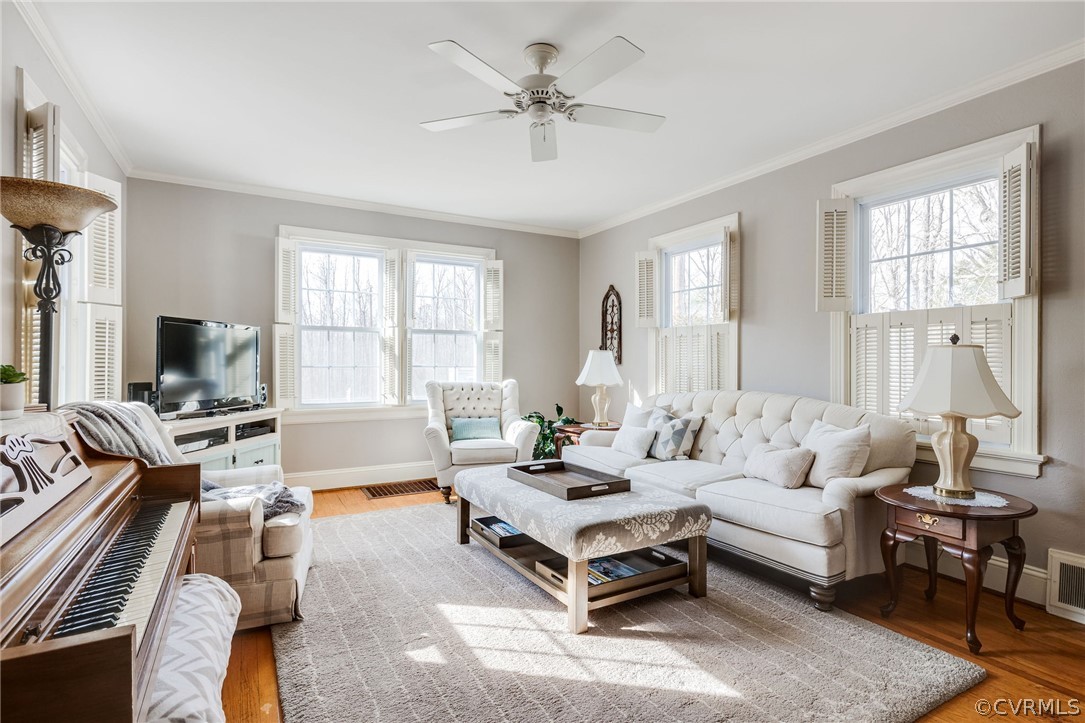 501 Old Hundred Road Midlothian, VA 23113 - Photo 14 of 44 a living room with furniture ceiling fan and a window