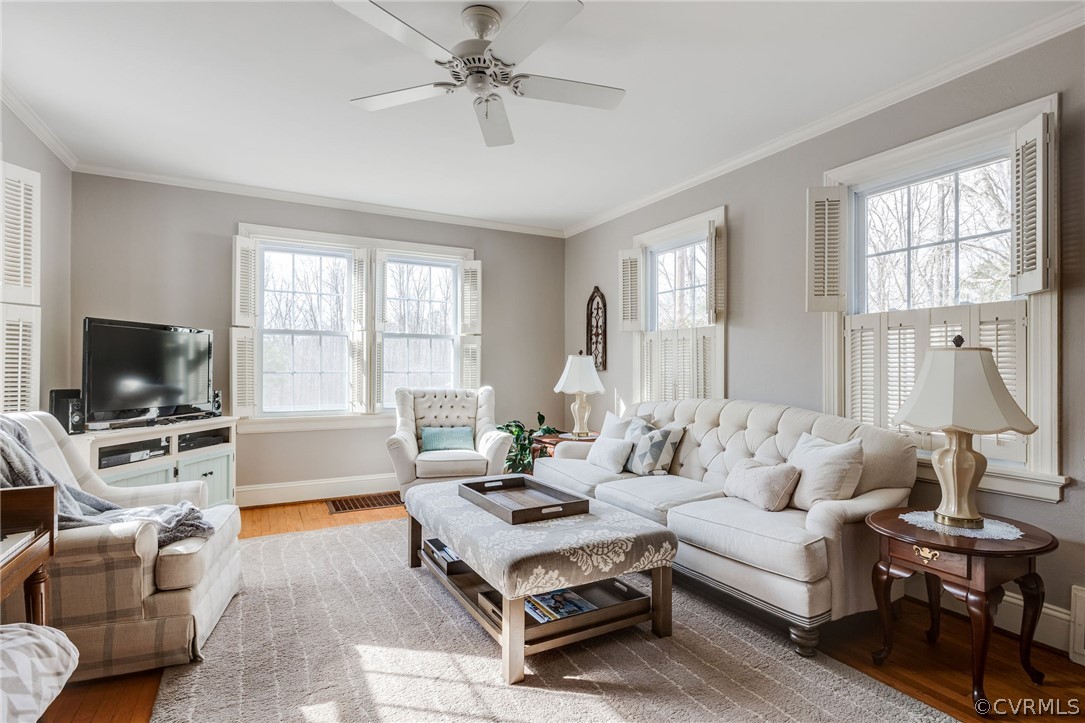501 Old Hundred Road Midlothian, VA 23113 - Photo 15 of 44 a living room with furniture a flat screen tv and a large window