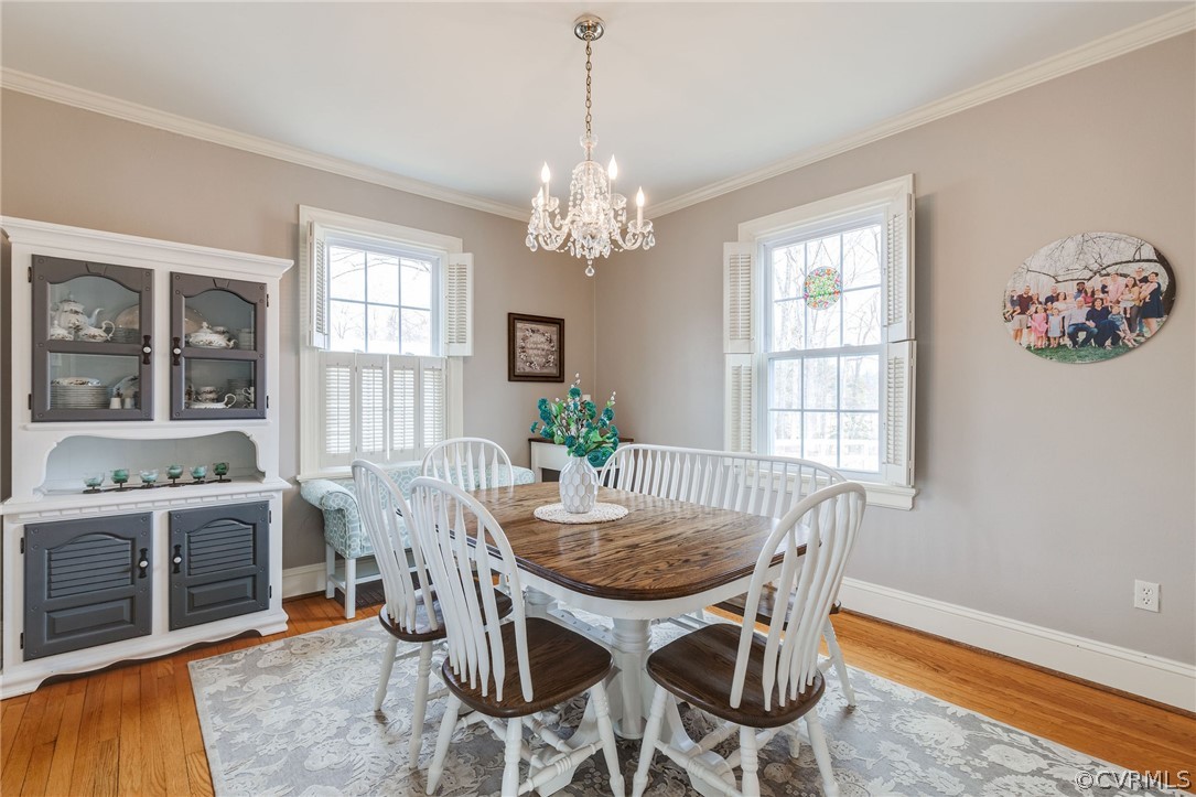 501 Old Hundred Road Midlothian, VA 23113 - Photo 17 of 44 a view of a dining room with furniture window and outside view