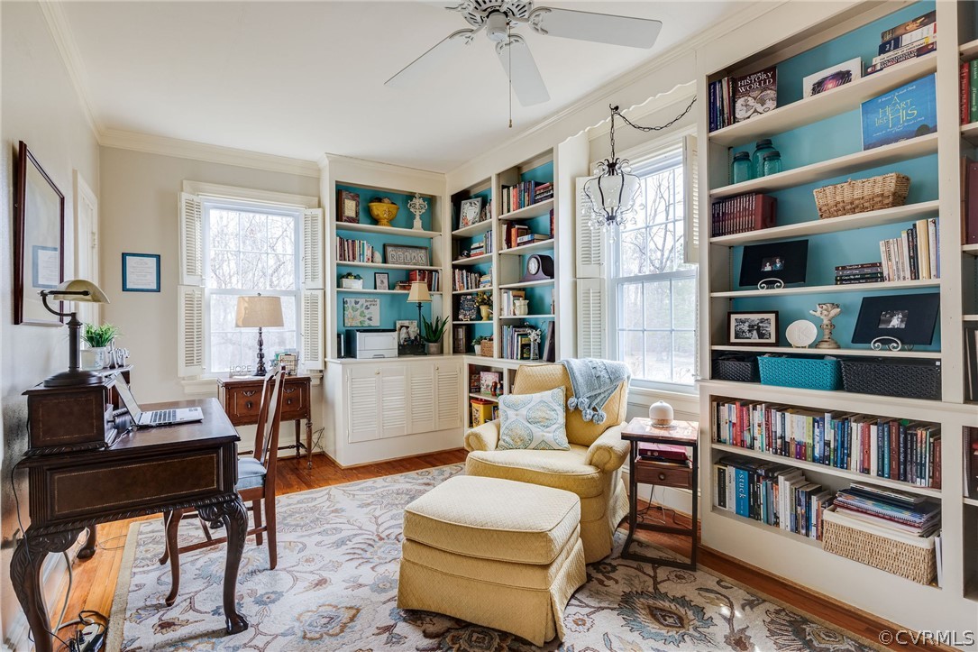 501 Old Hundred Road Midlothian, VA 23113 - Photo 26 of 44 a living room with furniture and a book shelf