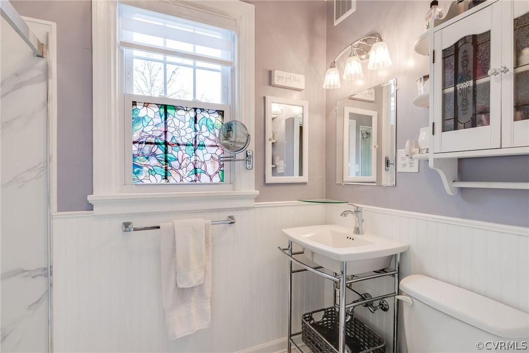 501 Old Hundred Road Midlothian, VA 23113 - Photo 28 of 44 a bathroom with a sink a toilet and a window
