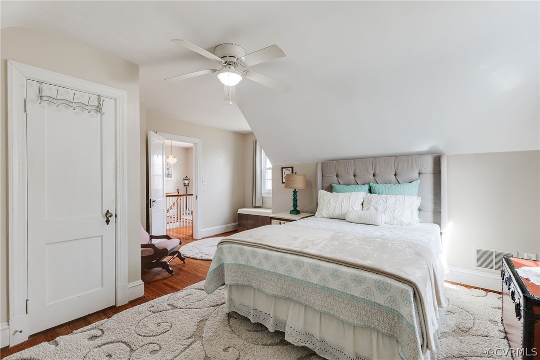 501 Old Hundred Road Midlothian, VA 23113 - Photo 34 of 44 a bedroom with a bed and a chandelier