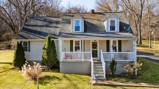 front view of a house with a yard