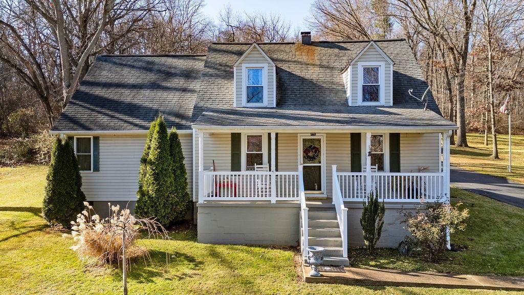 front view of a house with a yard