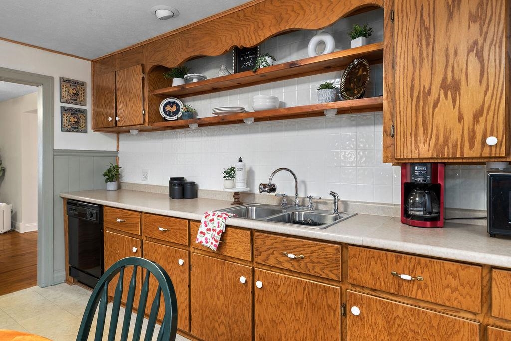 115 Old Hermitage Road Waynesboro, VA 22980 - Photo 13 of 63 a kitchen with stainless steel appliances granite countertop a sink a stove and cabinets