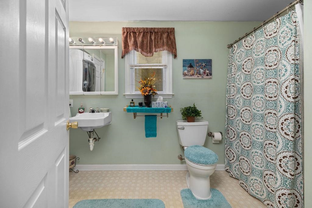 115 Old Hermitage Road Waynesboro, VA 22980 - Photo 16 of 63 a bathroom with a toilet sink and mirror
