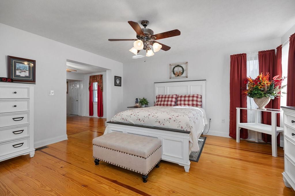 115 Old Hermitage Road Waynesboro, VA 22980 - Photo 20 of 63 a bedroom with a bed and ceiling fan