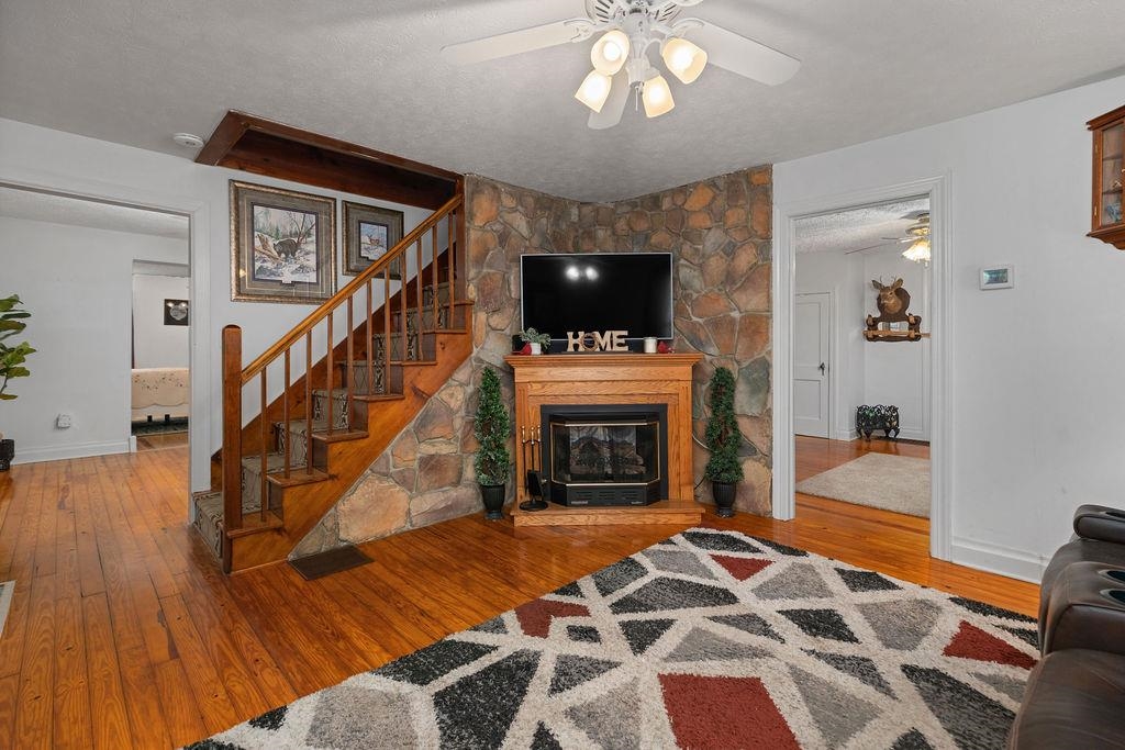 115 Old Hermitage Road Waynesboro, VA 22980 - Photo 4 of 63 a living room with fireplace furniture and a flat screen tv