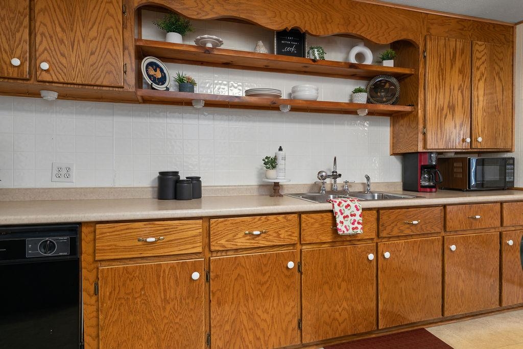 115 Old Hermitage Road Waynesboro, VA 22980 - Photo 10 of 63 a kitchen with stainless steel appliances granite countertop a sink and cabinets