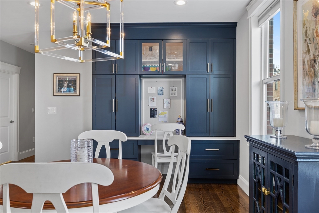 57 L Street, Unit 6 Boston, MA 02127 - Photo 6 of 21 a view of a dining room with furniture window and wooden floor